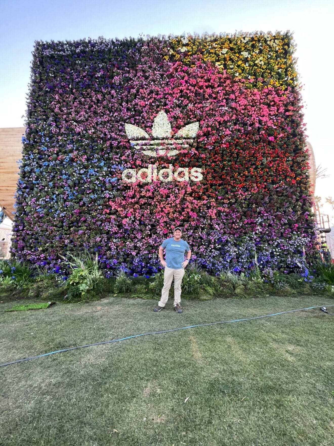 David at Coachella in front of the flower cube